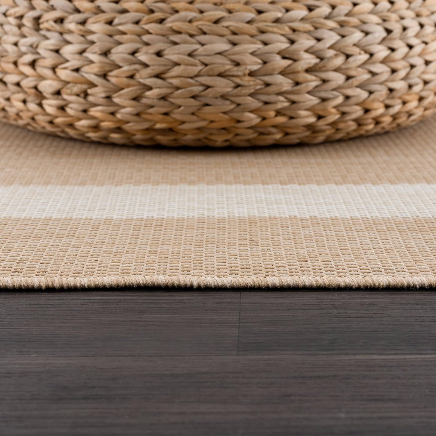 CAMILSON UV-protected rug resists sun fading on sunny patios.