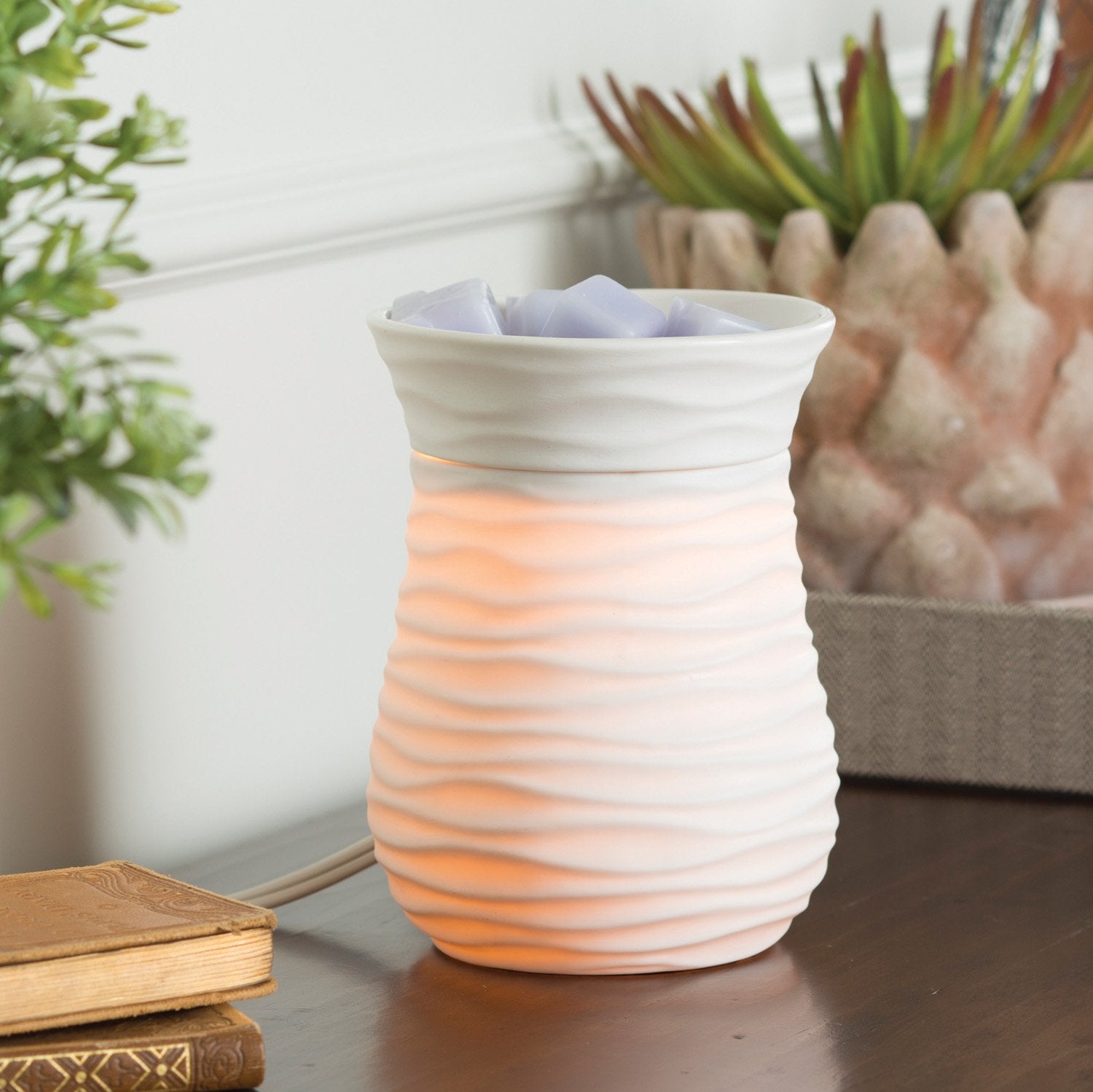 Candle Warmers Illumination Warmer side view highlights warm lighting in ambient setup