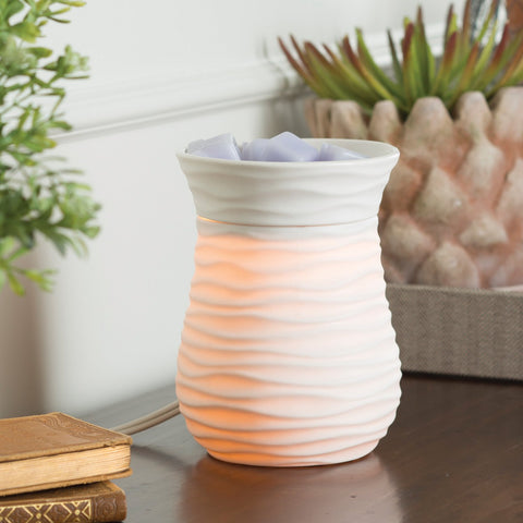 Candle Warmers Illumination Warmer side view highlights warm lighting in ambient setup