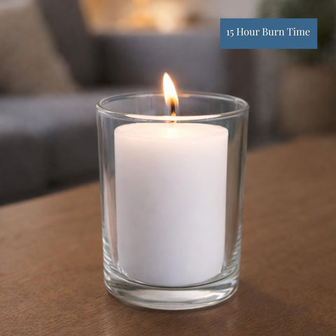 Candlestock restaurant ambiance with white votive candles enhances dining atmosphere.