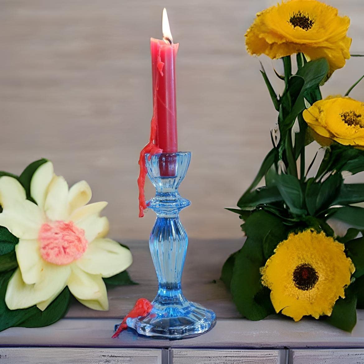 Candlestock wine bottle drip candle red sparks energy and warmth