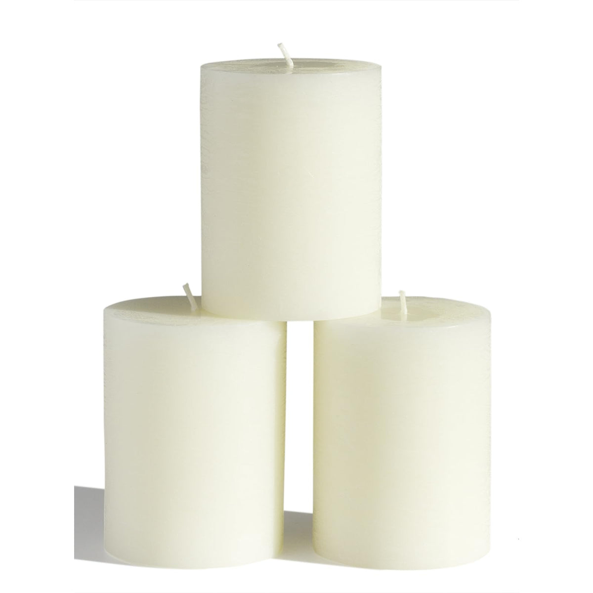 CANDWAX 3x4-inch ivory pillar candles set for elegant tabletop decor and long-lasting ambiance.