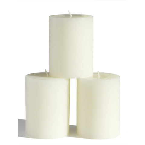 CANDWAX 3x4-inch ivory pillar candles set for elegant tabletop decor and long-lasting ambiance.