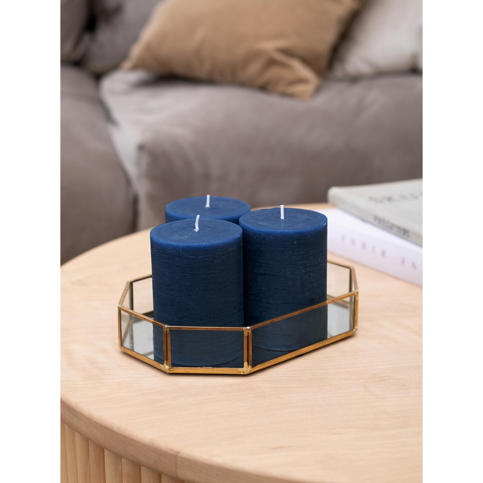CANDWAX wedding centerpiece navy pillar candles add subtle elegance.