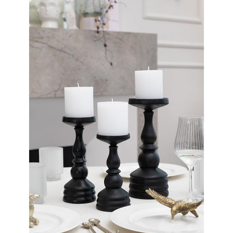 CANDWAX white pillar candles ideal for wedding decor and centerpieces.