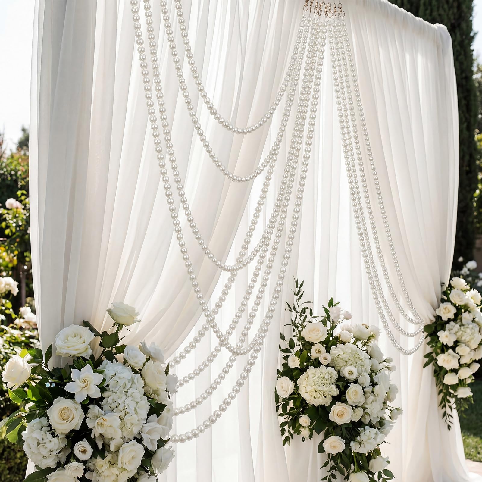 Two-pack pearl garland set enables layered decor options.