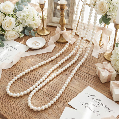 Ivory white Canlierr pearl garland, 25mm beads, 5.6ft length for photography.