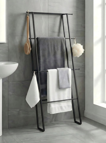 CANYAVE metal leaning ladder towel rack assembled against wall saves space for towels.