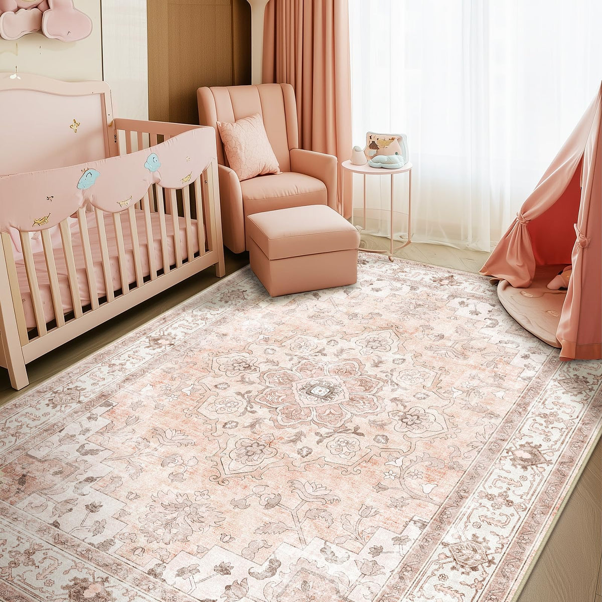 Capaloca machine-washable rug with pink floral pattern for bright nursery decor.