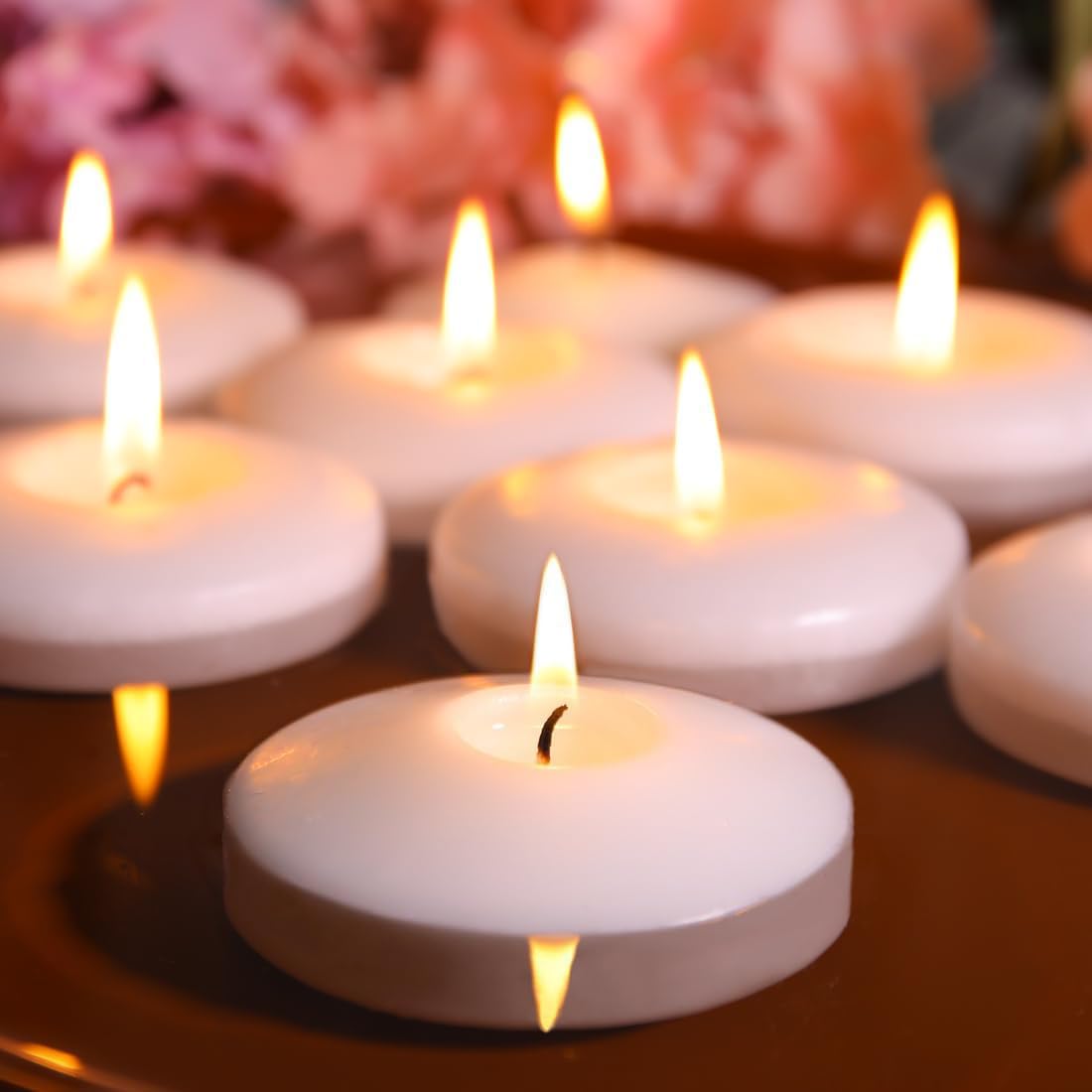 Capaniel 3-inch white floating candle pack glows beautifully for elegant centerpieces.