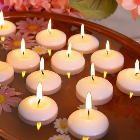 Capaniel 48-pack 2-inch floating candle used in a centerpiece display for an elegant tablescape
