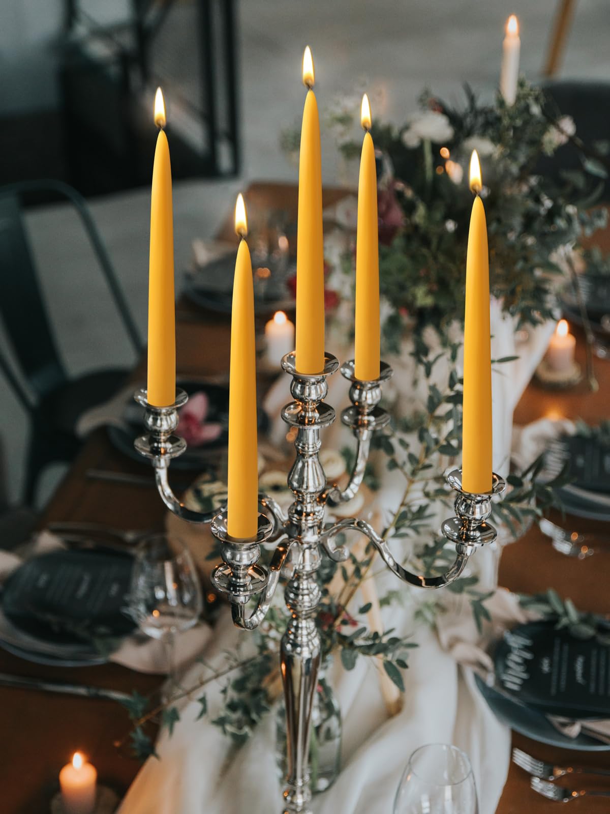 Capaniel handmade beeswax taper candle crafted by artisans.