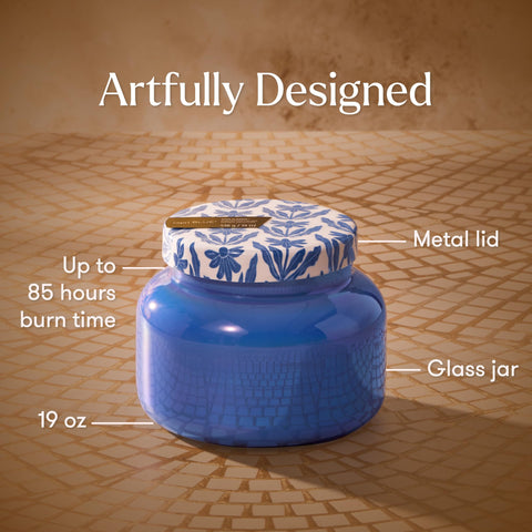 Capri Blue iridescent glass jar adds stylish decor and shimmer.