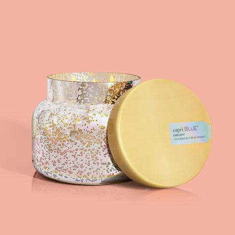 Capri Blue modern marble travel tin showcases Aloha Orchid fragrance on the go.