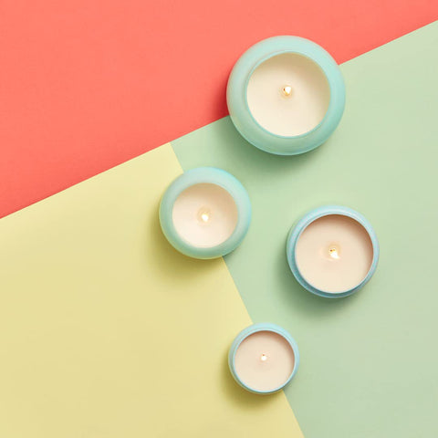 Capri Blue Volcano Aqua citrus-fruit notes evoke summer freshness and mood uplift.