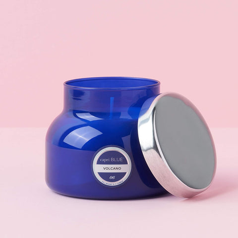 Capri Blue Volcano blue glass candle enhances any decor with iconic style.