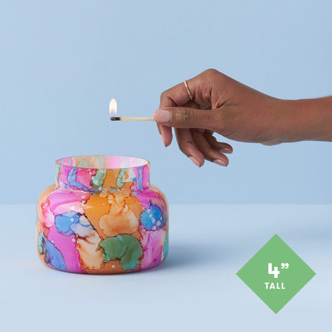 Capri Blue Volcano vessel displays colorful watercolor pattern and unique charm.