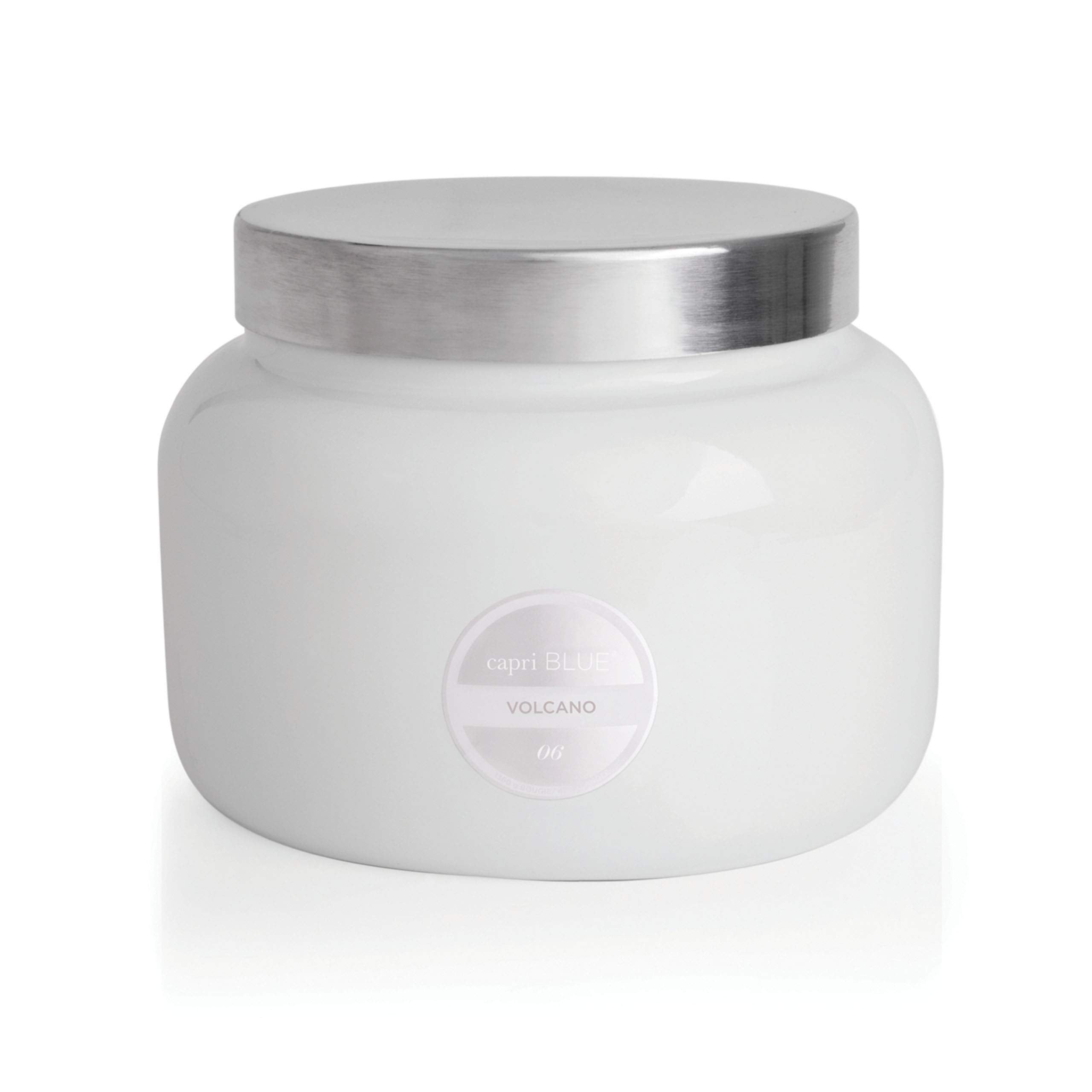 Capri Blue Volcano jar lit in evening creates warm ambient glow.