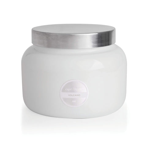 Capri Blue Volcano jar lit in evening creates warm ambient glow.