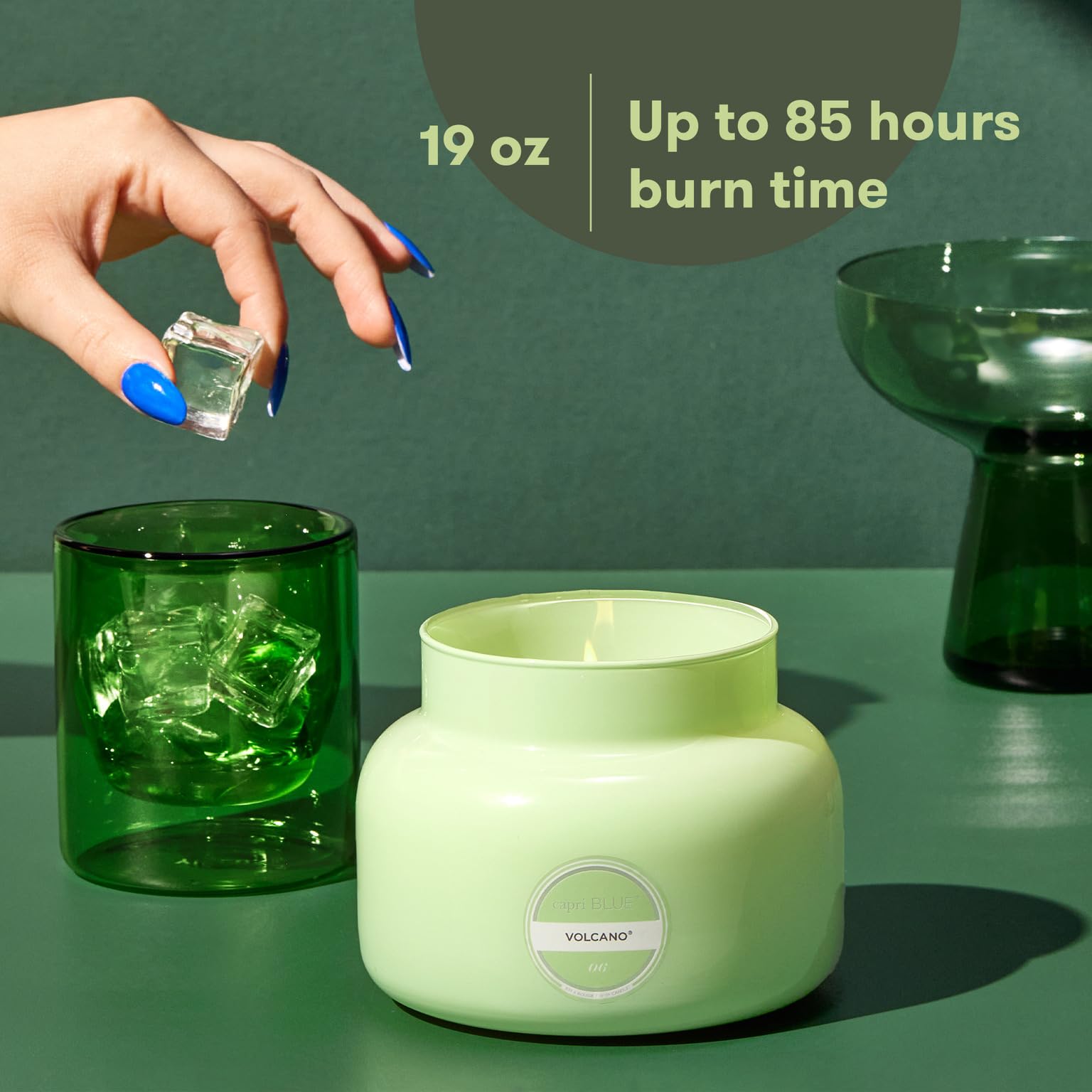 Capri Blue Volcano jar with soft glow enhances modern living spaces.