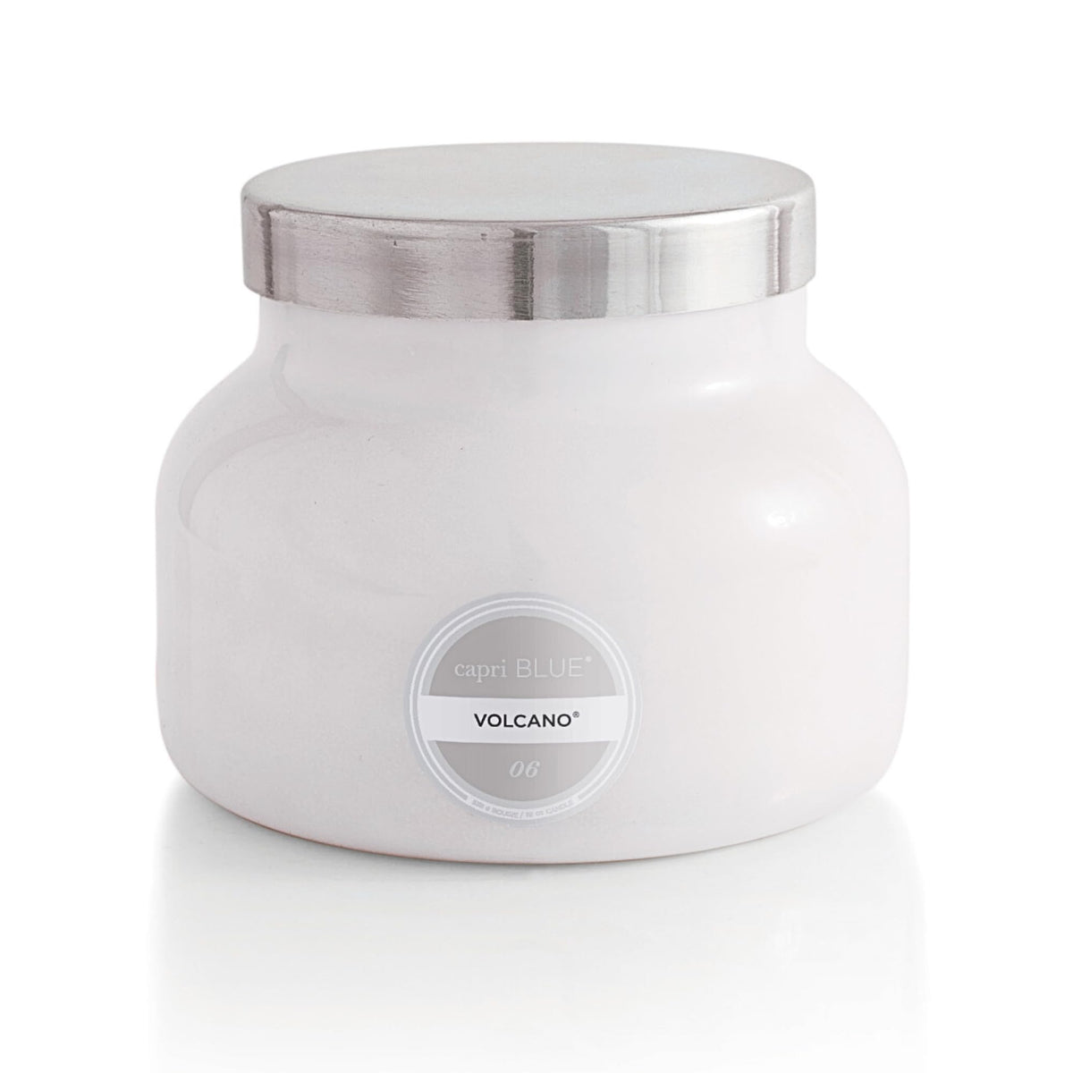 Capri Blue Volcano white jar candle brightens spaces with tropical citrus aroma.