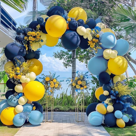 Captank navy and royal blue balloons arranged for a dramatic arch backdrop.