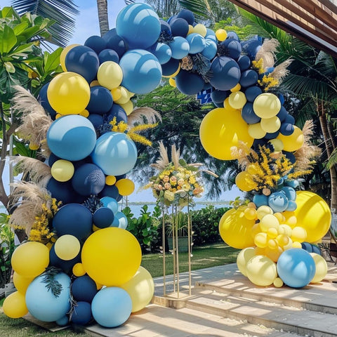 Captank bridal shower balloon arch in navy and yellow tones.