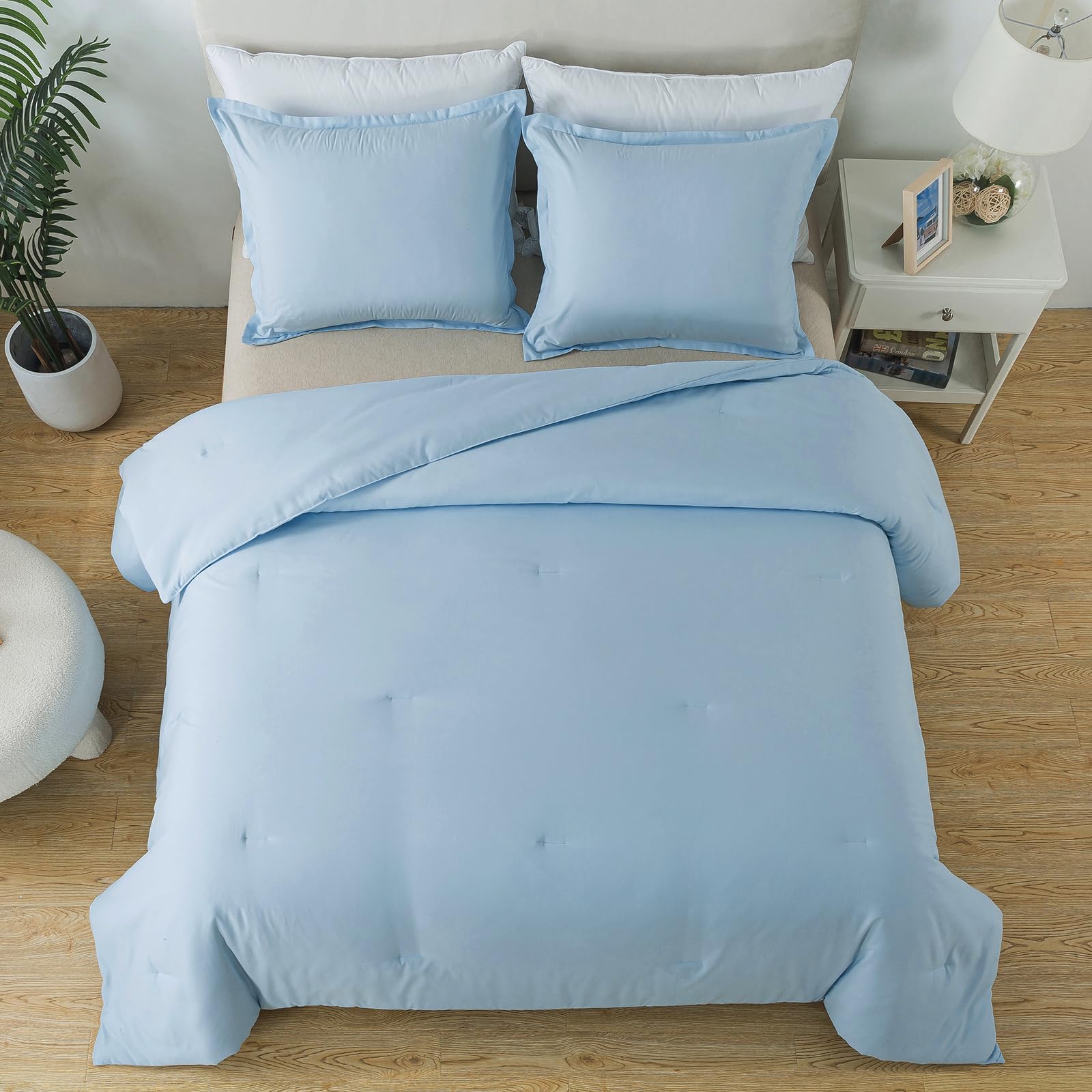 Caressma light blue comforter durable microfiber fabric withstands frequent washing