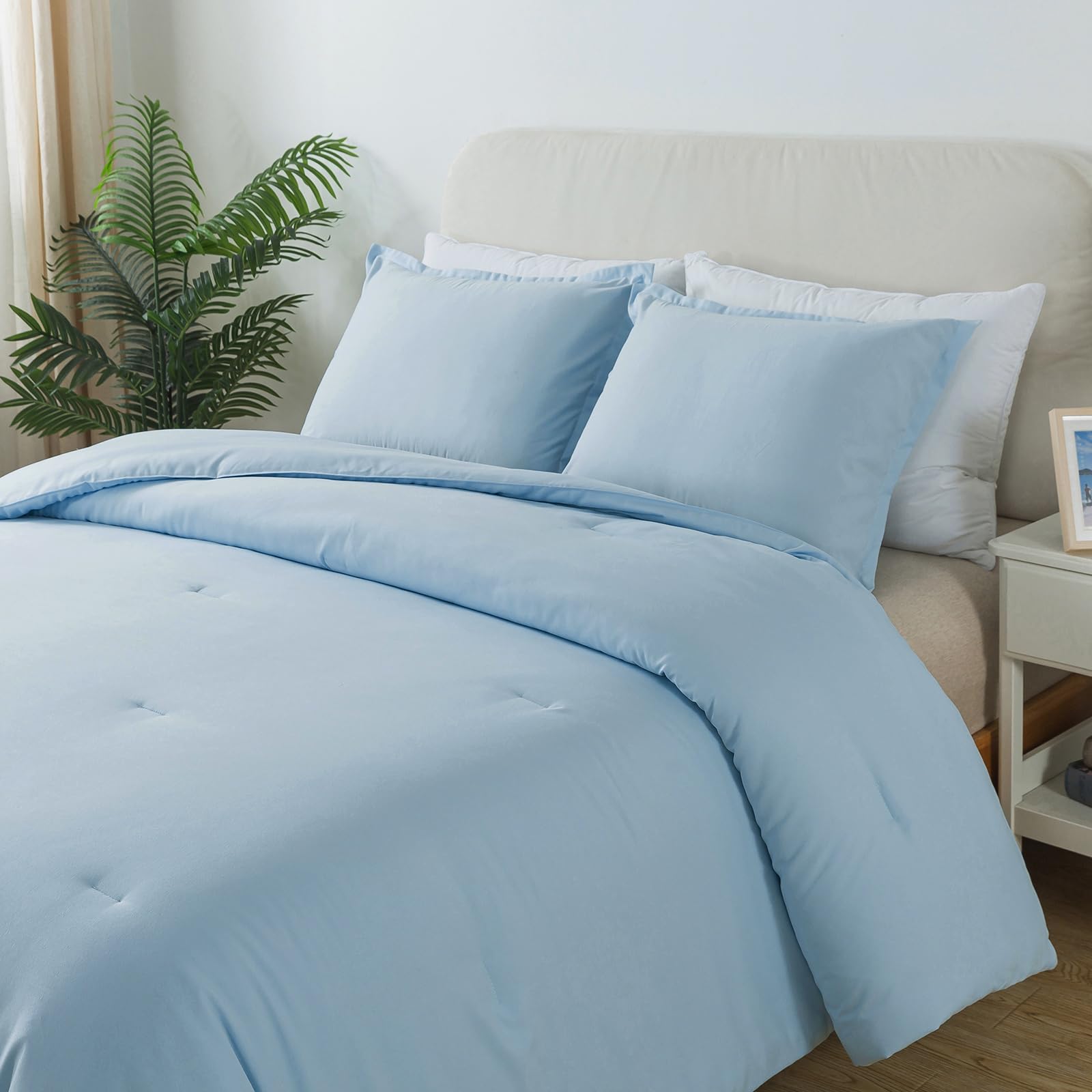 Caressma light blue comforter vacuum-packaged, easy to air out and fluffy