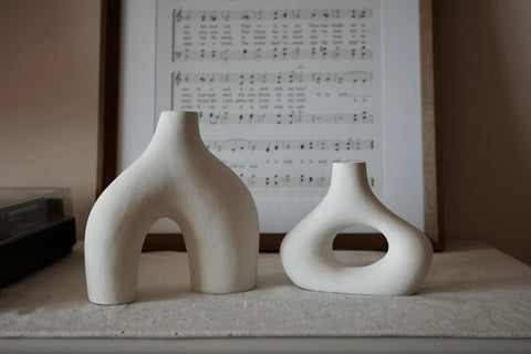Carrot's Den vase set displayed as dining table centerpiece.