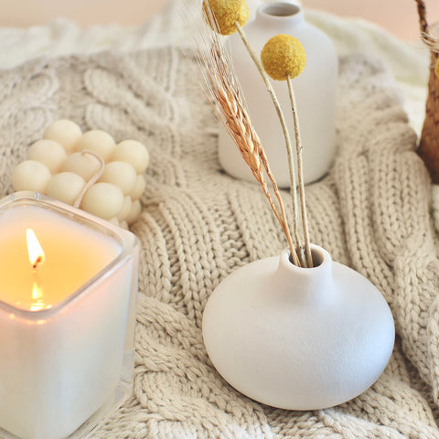 Compact and chic, these vases complement wedding tabletops and coffee tables.