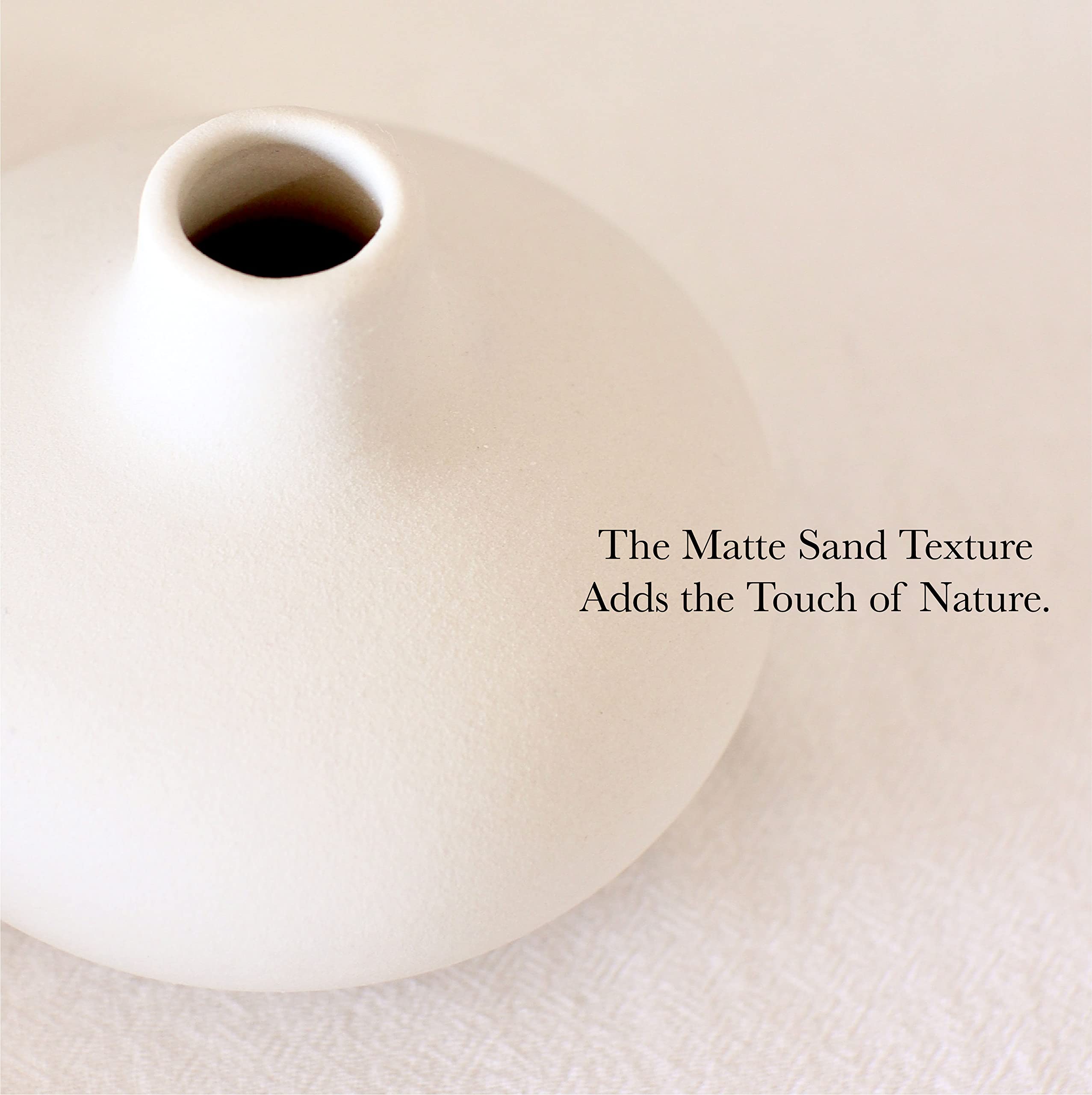 Durable ceramic with a clean white glaze suits minimalist interiors.