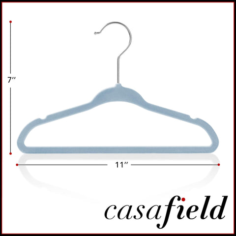Casafield baby closet organization setup using light-blue velvet hangers.
