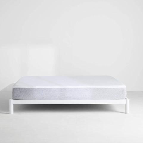Head and foot labels on Casper protector for easy bed setup
