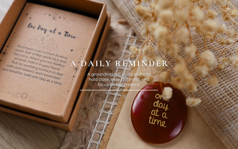 CASTATEO red agate keepsake with One Day at a Time for daily resilience.