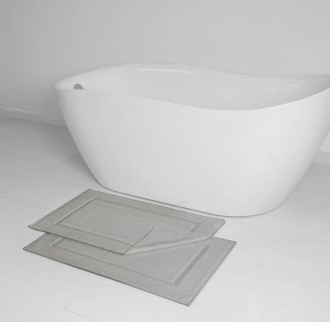 Casual Living grey cotton bath mat pile closeup, shows plush texture and softness.