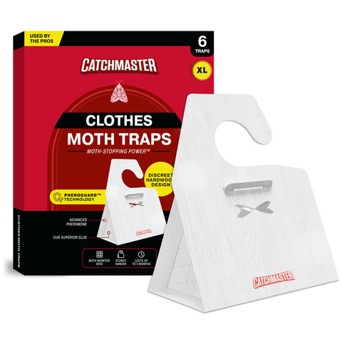 Catchmaster clothing moth traps with XL hardwood design attract moths in a closet, protecting textiles.