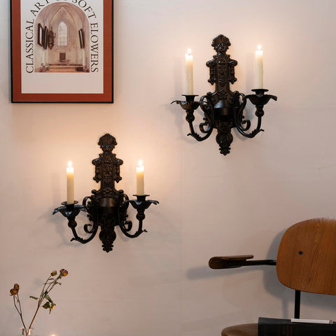 Close-up of CC Wonderland Zone Gothic sconce showing sturdy metal construction and black coating.