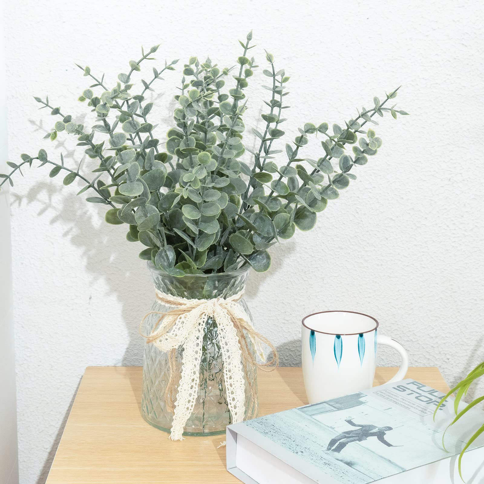 CEWOR stems ready for bouquet assembly with eucalyptus leaves