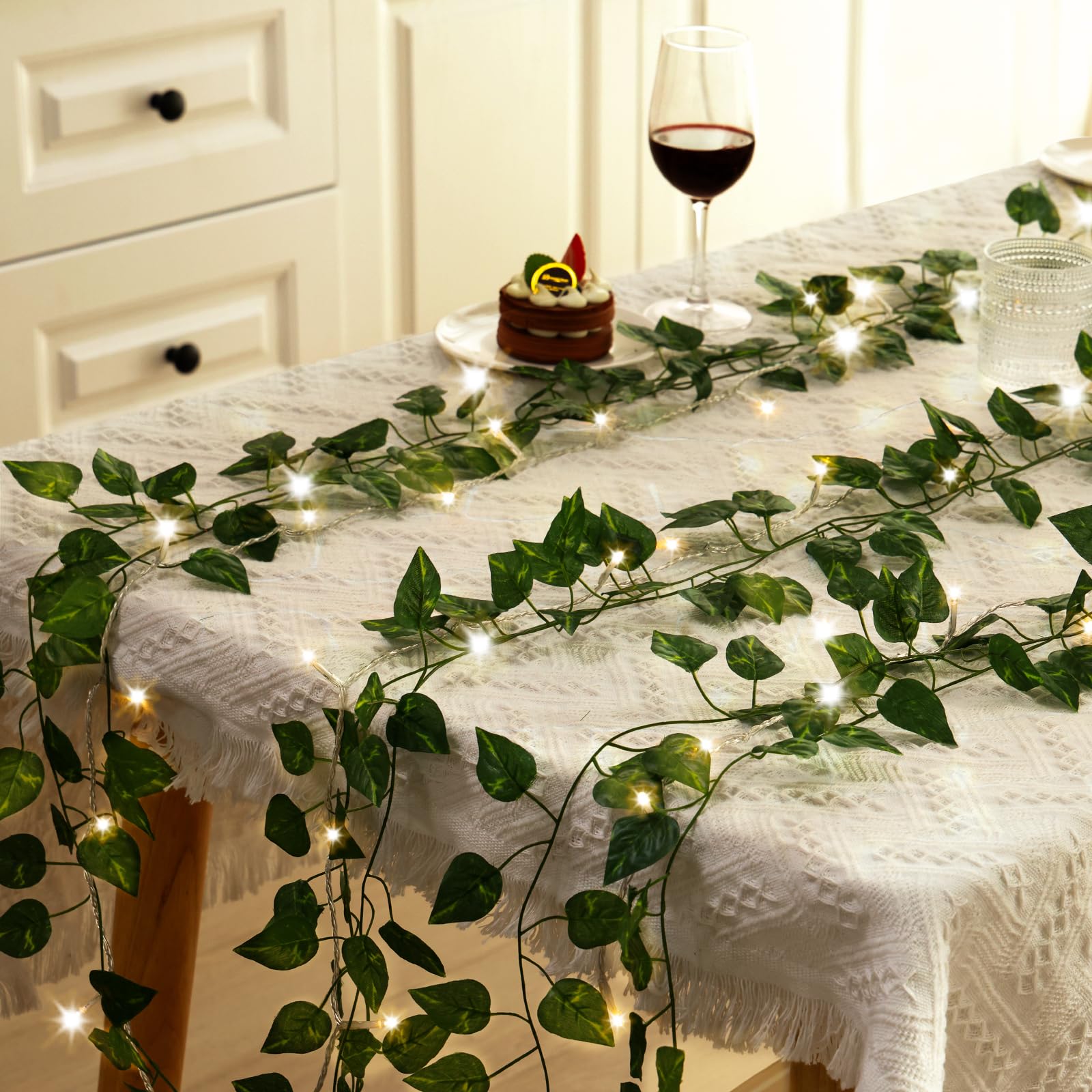 Close-up of CEWOR cloth leaves on the ivy garland