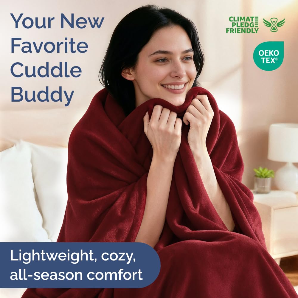 CGK Unlimited burgundy blanket on bed with elegant color