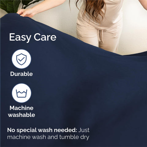 CGK Unlimited navy sheets stay breathable to help sleep cooler