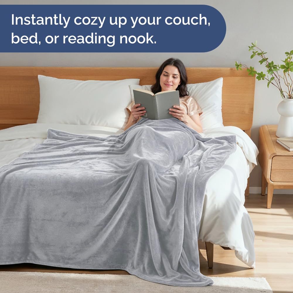 CGK Unlimited couch blanket styled on sofa for cozy lounging