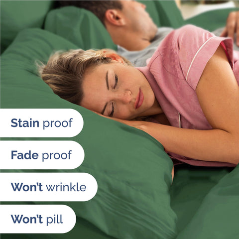 Emerald green CGK Unlimited bed on mattress showing sleek fit
