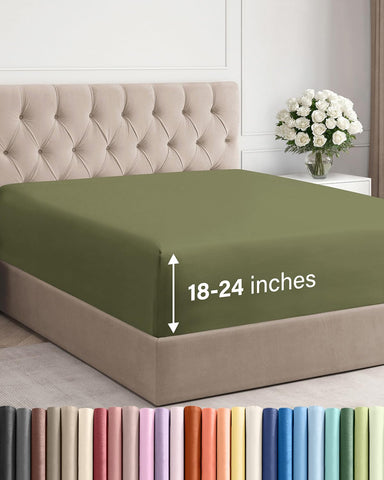 CGK Unlimited extra deep king sheet in sage green on bed, secure and snug.