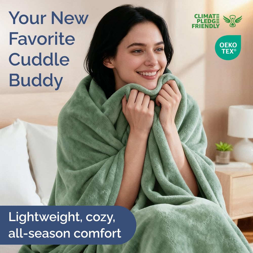 CGK Unlimited flannel fleece blanket on queen bed in sage green for all-season coziness