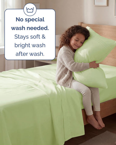 CGK Unlimited hotel-luxury vibe in a bedroom with neatly tucked sheets.