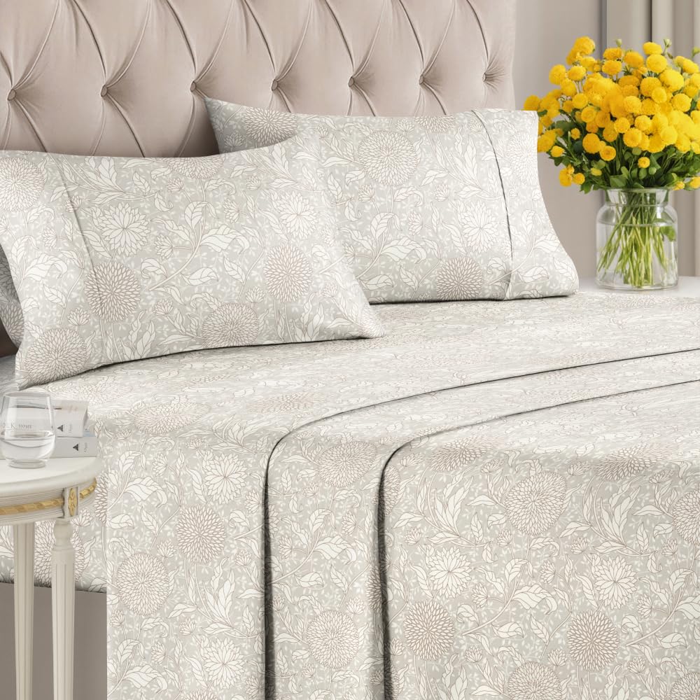 CGK Unlimited king-size bed with beige floral sheets for chic bedroom look.