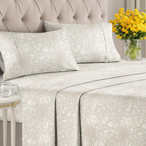 CGK Unlimited king-size bed with beige floral sheets for chic bedroom look.