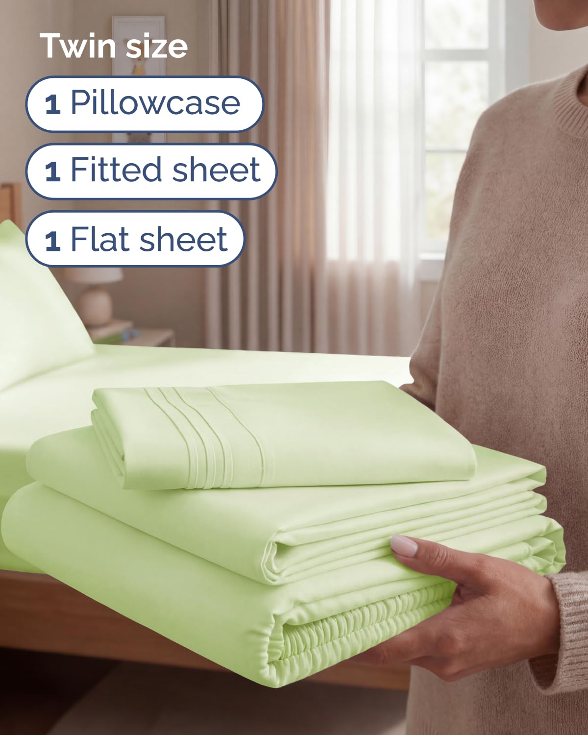 CGK Unlimited light sage green fabric bed sheets shown in a calm bedroom setup.